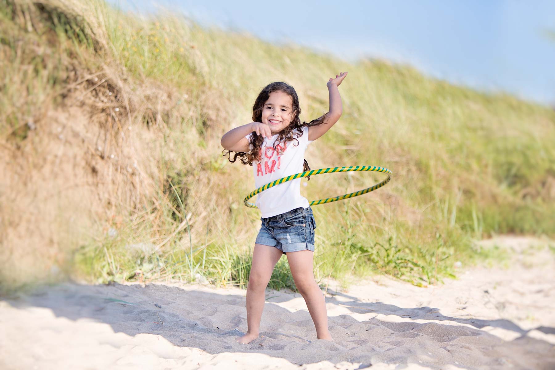 Girl playing with hula hoop