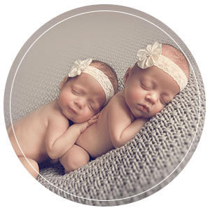 Twin newborn babies sleeping