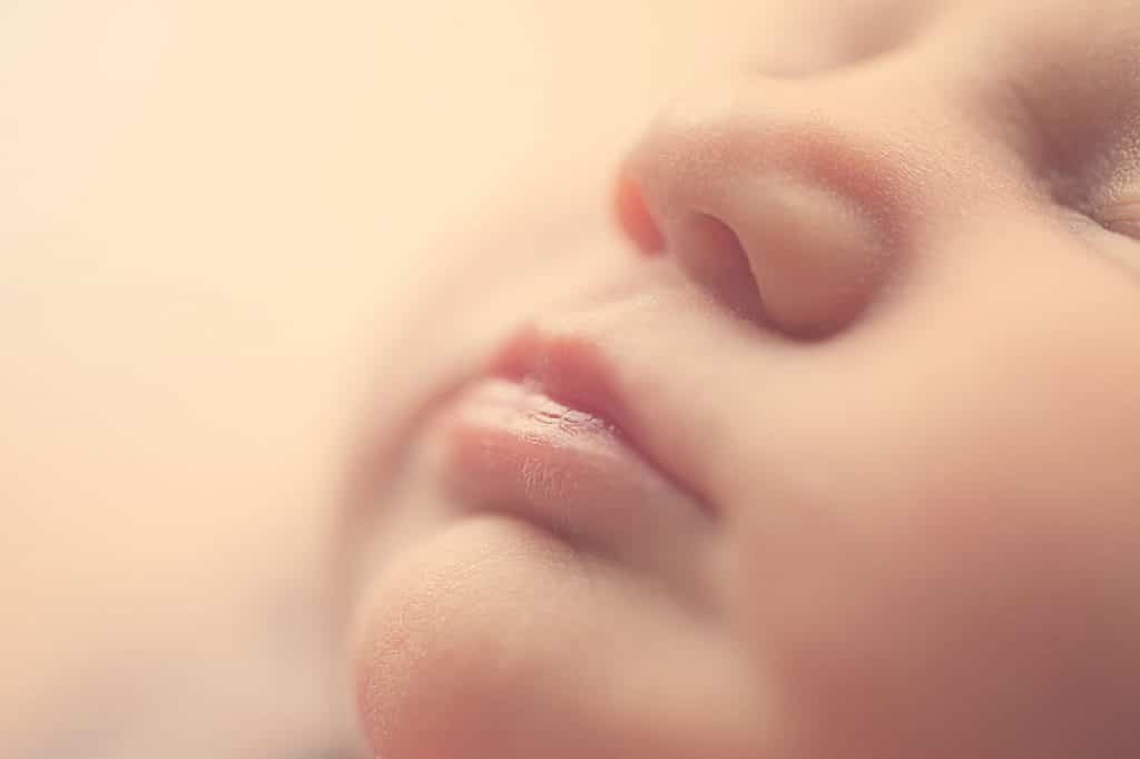 Image of a newborn baby's lips and nose