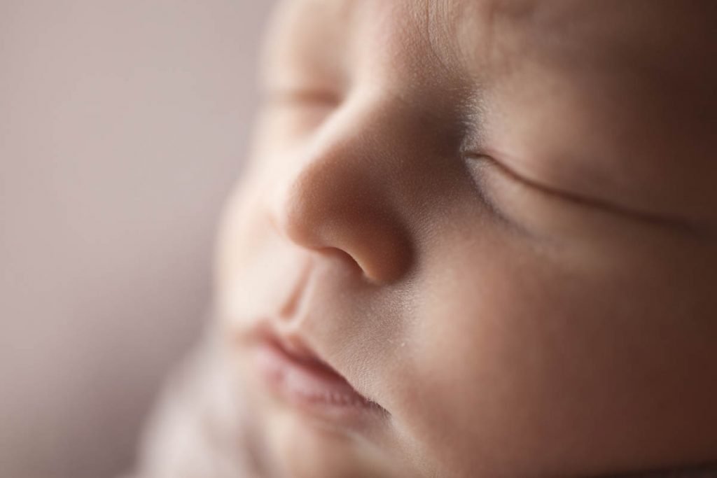 profile portrait of newborn baby