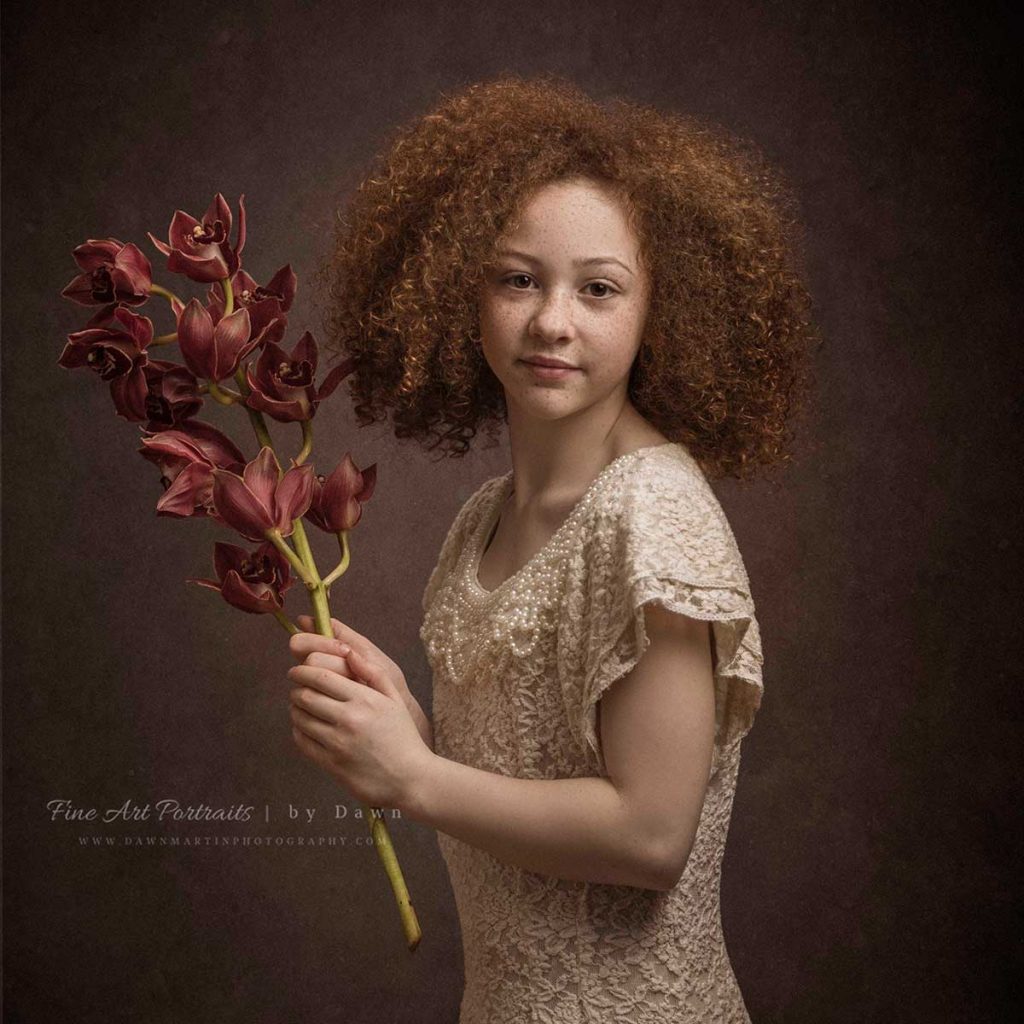 Fine Art Portrait of girl with red hair holding flowers